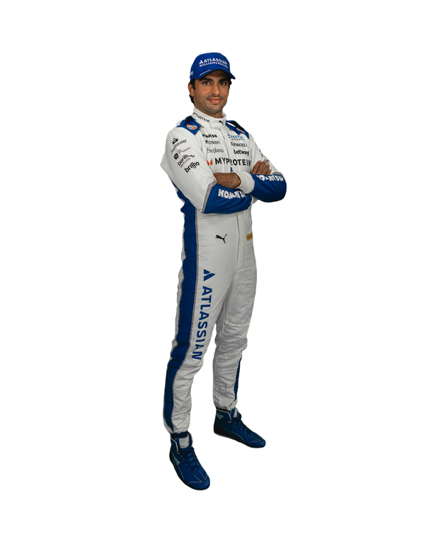 Carlos Sainz wearing a 2025 US GP F1 Racing Suit with blue accents on a white background .Explicit Pro